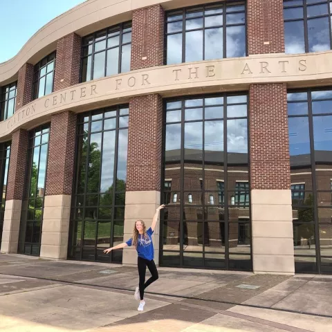 A ballet dancer in front of Clayton Center for the Arts in Maryville, TN