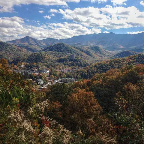 Gatlinburg surrounded by the Great Smoky Mountains in TN.