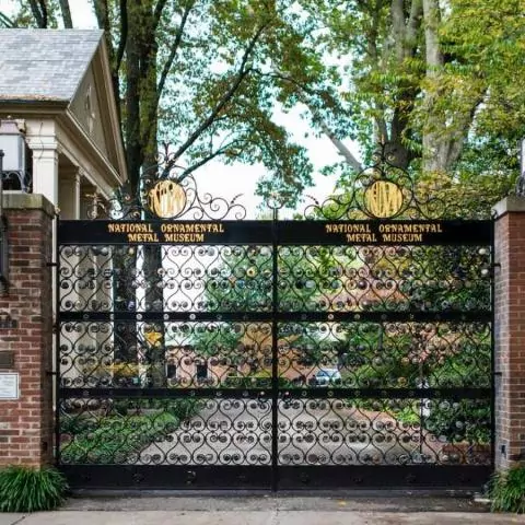 A view of the 10th Anniversary Gates at the entrance to the Metal Museum.