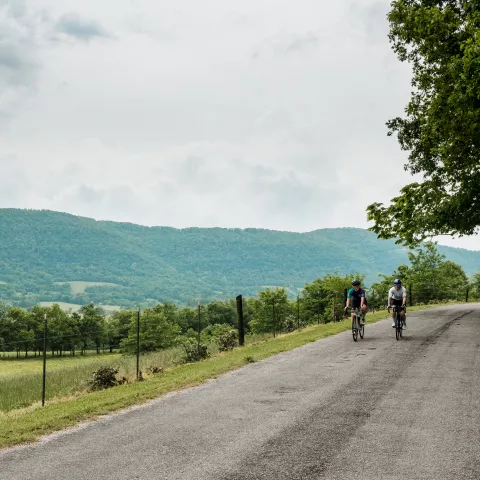 A pair of cyclists bike through the Upper Sequatchie Valley.